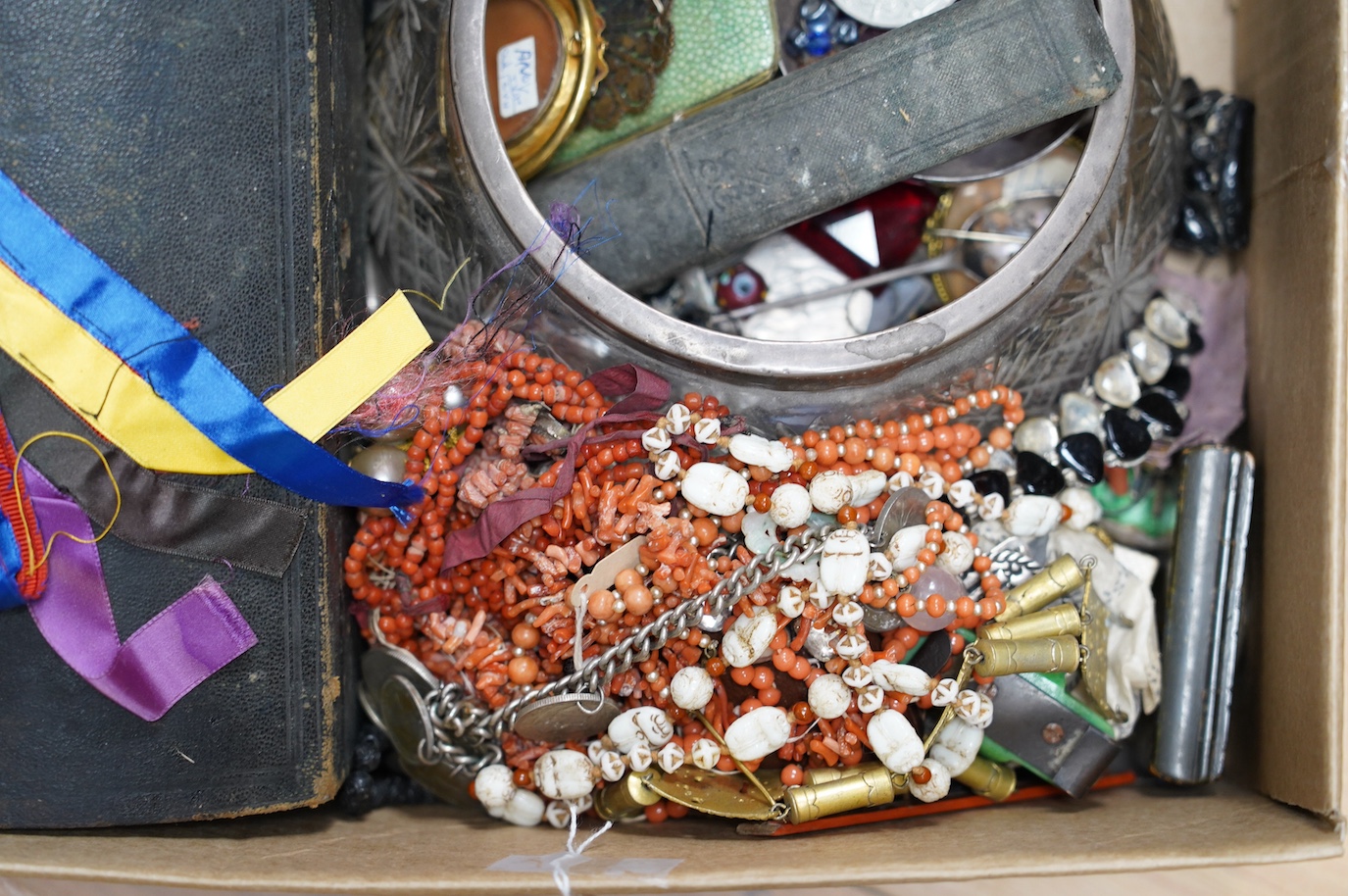 A large quantity of assorted silver, jewellery, coins and curios including cameos, coral necklaces, wine label, costume, steel buckles and jewellery boxes